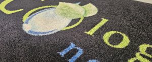 Tapis d'entrée personnalisé avec le logo de l'entreprise de nettoyage Ecologique Nettoyage.